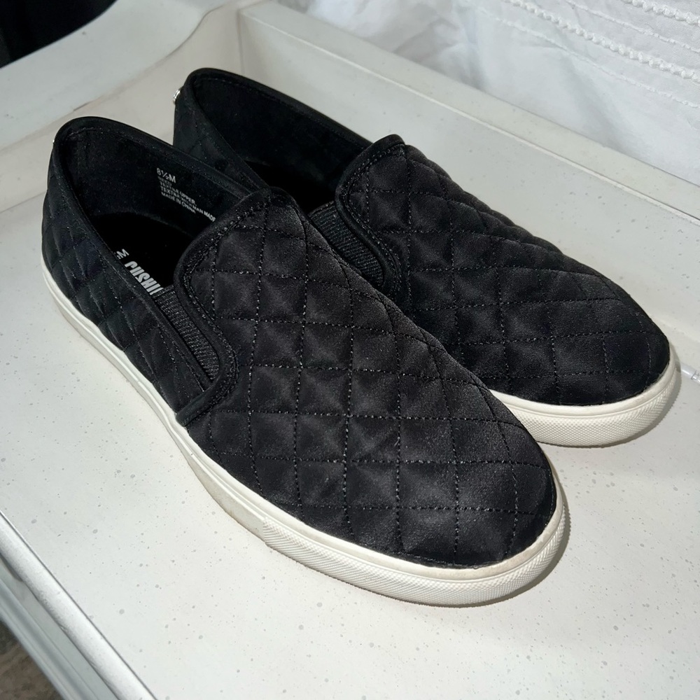 Quilted black slide on sneaker